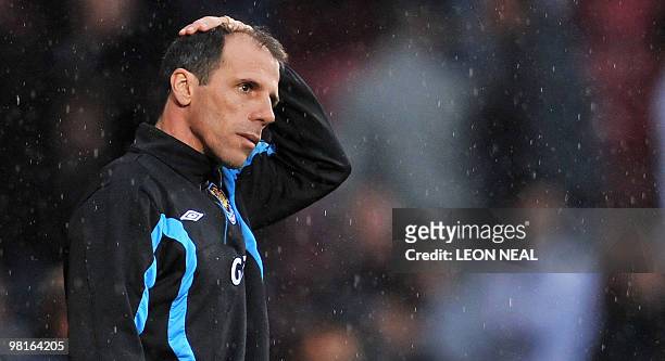 West Ham's Italian manager Gianfranco Zola gestures after their 0-1 defeat in the English Premier League football match between West Ham United and...