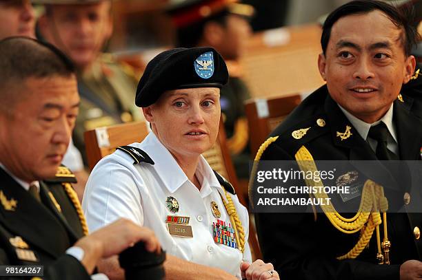 Military attache Colonel Brey Sloan along with other attaches attends a military parade marking the Myanmar's 65th Armed Forces Day at a parade...