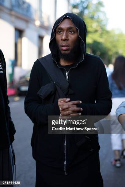 Mos Def is seen on the street during Paris Men's Fashion Week S/S 2019 wearing a black hoodie on June 22, 2018 in Paris, France.