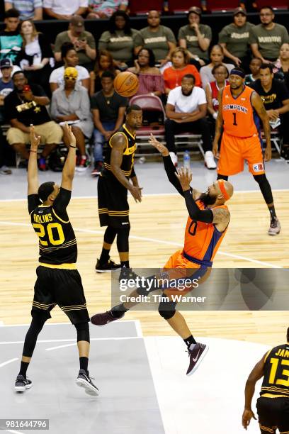 Drew Gooden of 3's Company shoots against Ryan Hollins of Killer 3s during week one of the BIG3 three on three basketball league at Toyota Center on...