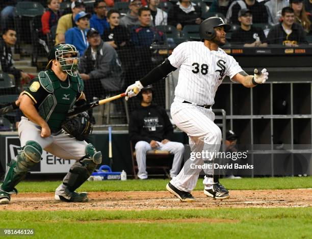 Omar Narvaez of the Chicago White Sox hits a two-RBI single against the Oakland Athletics during the second inning in game two of a doubleheader on...