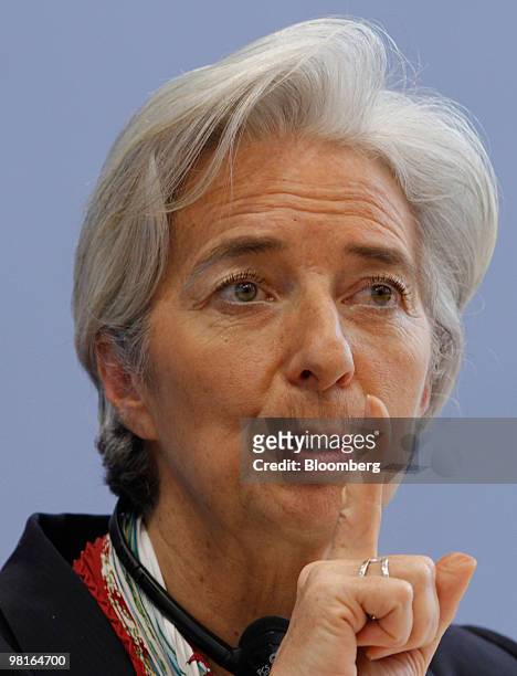 Christine Lagarde, France's finance minister, gestures while speaking after a meeting of the German federal Cabinet in Berlin, Germany, on Wednesday,...