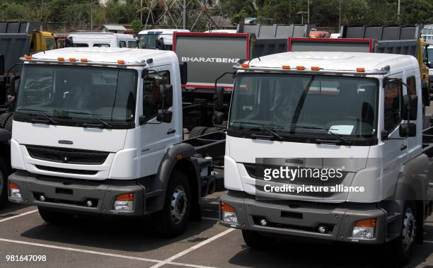 March 2018, Germany, Chennai: Lorries standing in the factory yard of the car manufacturer Daimler. The Daimler factory in Chennai has been producing...