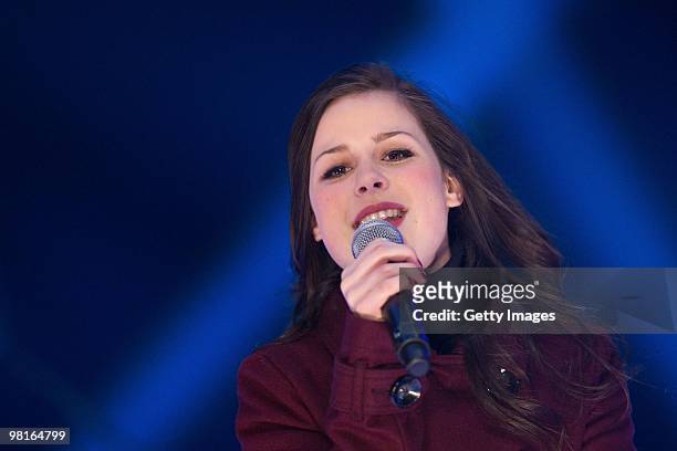 German singer Lena Meyer-Landrut performs on stage during the 'TV Total Wok WM 2010' on March 19, 2010 in Oberhof, Germany.