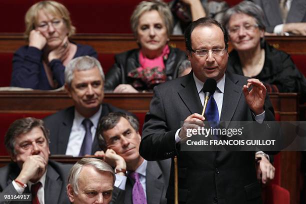 Former French general secretary of the Socialist party Francois Hollande delivers a speech, on March 31 during the weekly session of questions to the...