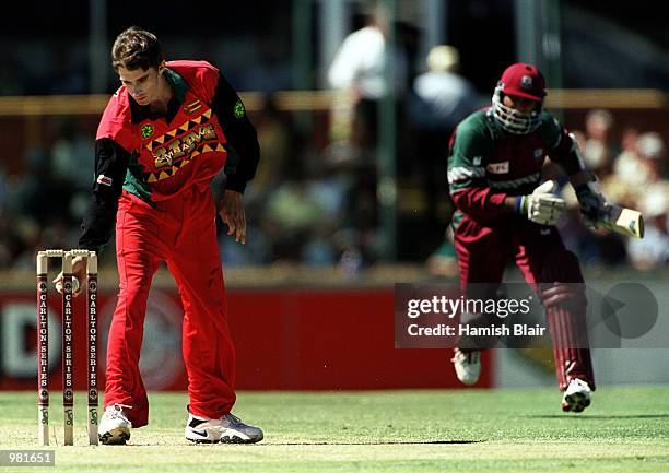 Daren Ganga of West Indies is run out by Brian Murphy of Zimbabwe for 22 during the Carlton Series One Day International between West Indies and...