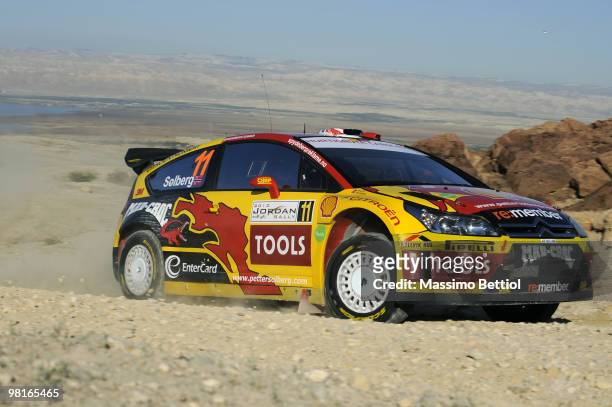 Petter Solberg of Norway and Phill Mills of Great Britain compete in their Citroen C4 during the Shakedown of the WRC Rally Jordan on March 31, 2010...