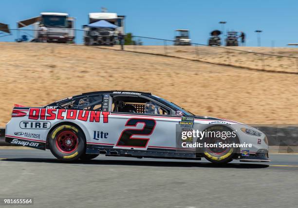 Brad Keselowski, driving the # Ford for Team Penske speeds over the lip on turn 8 on Friday, June 22, 2018 at the Toyota/Save Mart 350 Practice day...