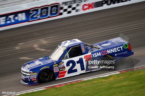 Johnny Sauter, driver of the ISM Connect Chevrolet, drives during practice for the NASCAR Camping World Truck Series Villa Lighting delivers the...