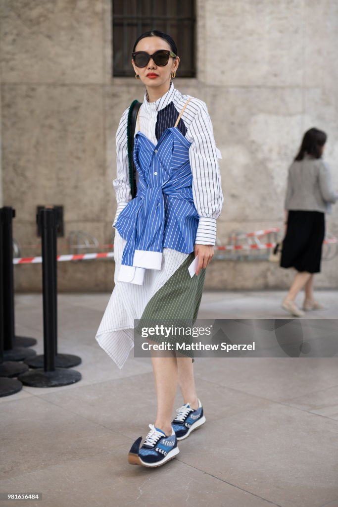 A guest is seen on the street during Paris Men's Fashion Week S/S