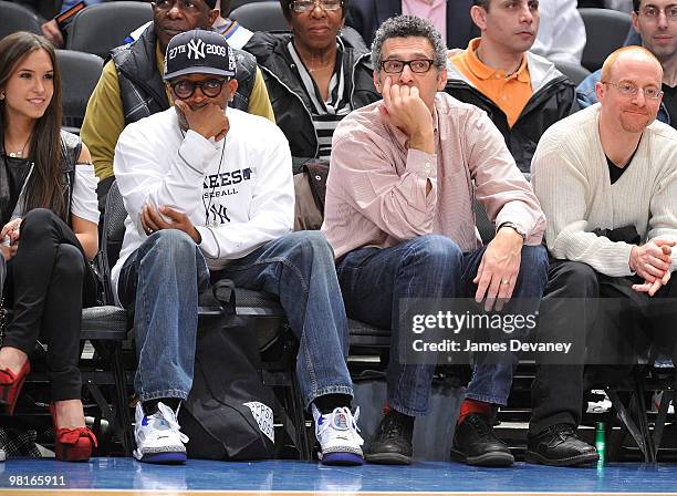 Spike Lee and John Turturro attends a game between the Philadelphia 76ers and the New York Knicks at Madison Square Garden on March 19, 2010 in New...