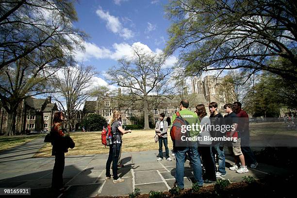 Group listens during a tour of the Duke University campus in Durham, North Carolina, U.S., on Friday, March 26, 2010. Duke offered admission this...