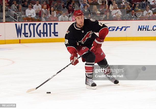 Derek Morris of the Phoenix Coyotes passes the puck up ice against the Colorado Avalanche on March 27, 2010 at Jobing.com Arena in Glendale, Arizona.