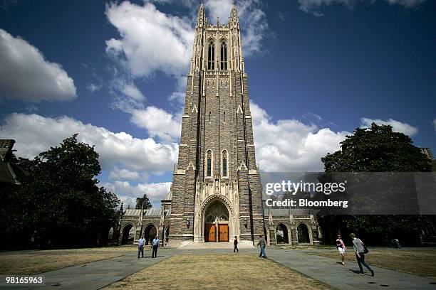 People walk near Duke Chapel on the campus of Duke University in Durham, North Carolina, U.S., on Friday, March 26, 2010. Duke offered admission this...