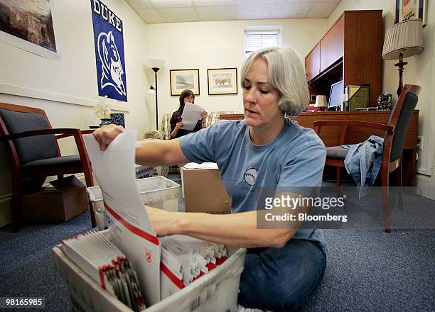 Joanie Brown of the undergraduate admissions office at Duke University prepares mailings for accepted students for the 2010-2011 school year, on...