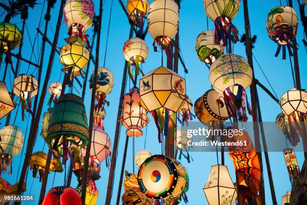 south korea, seoul, lanterns lit up in the buddhist temple of jogyesa - korea imagens e fotografias de stock