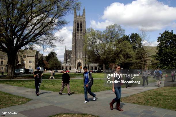 People walk by Duke Chapel on the campus of Duke University in Durham, North Carolina, U.S., on Friday, March 26, 2010. Duke offered admission this...