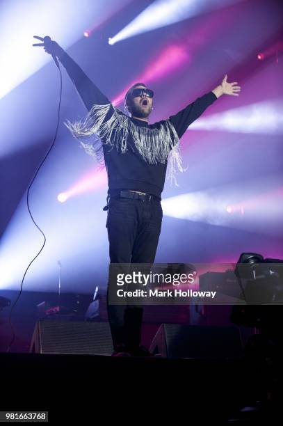 Tom Meighan of Kasabian performing on the main stage during the Isle of Wright Festival at Seaclose Park on June 22, 2018 in Newport, Isle of Wight.