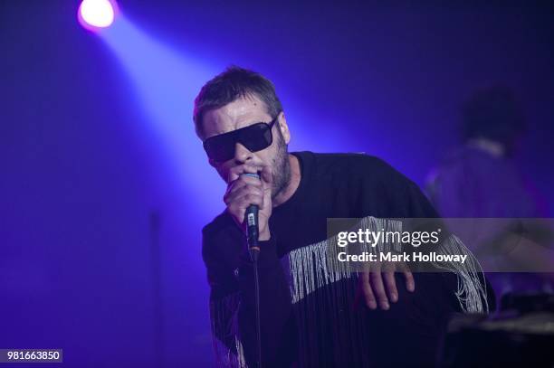 Tom Meighan of Kasabian performing on the main stage during the Isle of Wright Festival at Seaclose Park on June 22, 2018 in Newport, Isle of Wight.