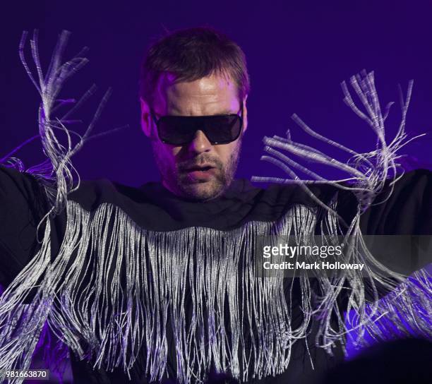 Tom Meighan of Kasabian performing on the main stage during the Isle of Wright Festival at Seaclose Park on June 22, 2018 in Newport, Isle of Wight.