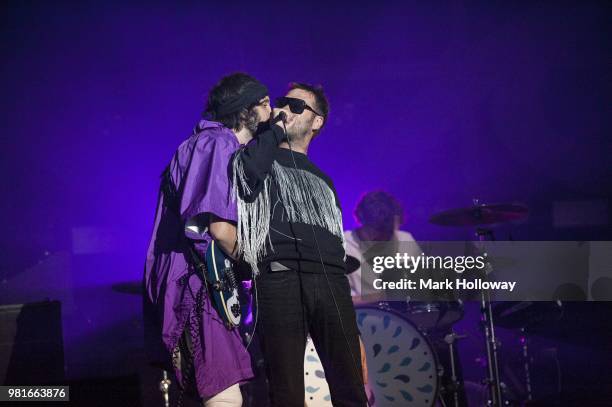 Tom Meighan Sergio Pizzorno of Kasabian performing on the main stage during the Isle of Wright Festival at Seaclose Park on June 22, 2018 in Newport,...