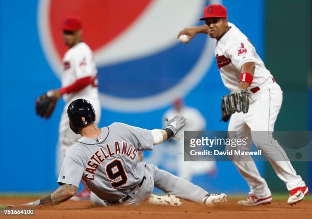 Jose Ramirez of the Cleveland Indians throws to first base after forcing Nicholas Castellanos of the Detroit Tigers out at second base on a ball hit...