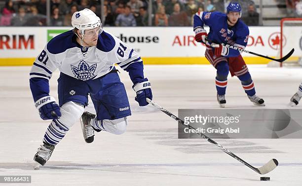 Phil Kessel of the Toronto Maple Leafs skates with the puck during the game against the New York Rangers on March 27, 2010 at the Air Canada Centre...