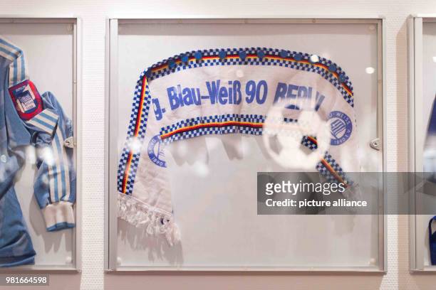 March 2018, Germany, Berlin: A scarf of the club hangs in their club's casino 'Zur Halbzeit' on the wall. In the year 1986/87, Blau-Weiß belonged to...