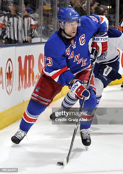 Chris Drury of the New York Rangers looks to pass the puck during the game against the Toronto Maple Leafs on March 27, 2010 at the Air Canada Centre...