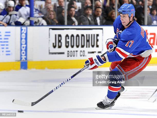 Brandon Dubinsky of the New York Rangers skates with the puck during the game against the Toronto Maple Leafs on March 27, 2010 at the Air Canada...