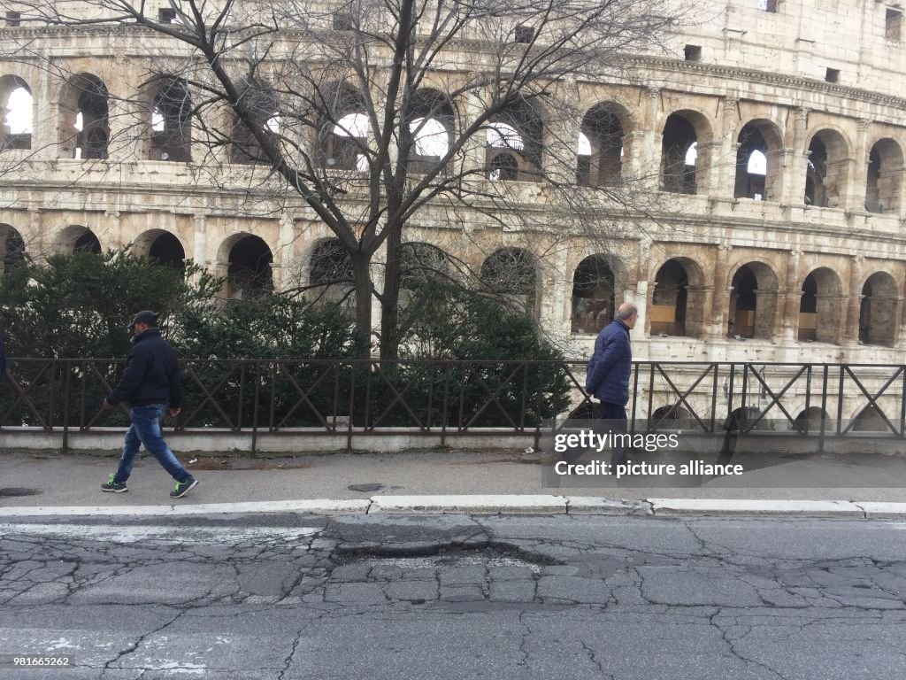 Jailbirds cleaning colloseum in Rome