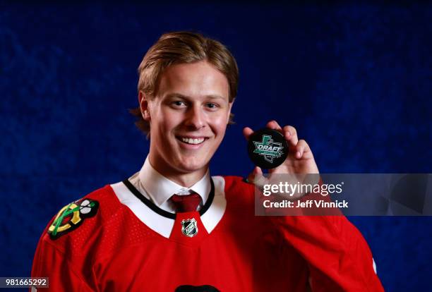 Adam Boqvist poses for a portrait after being selected eighth overall by the Chicago Blackhawks during the first round of the 2018 NHL Draft at...