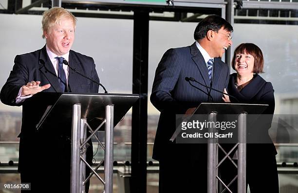 Steel magnate Lakshmi Mittal and Olympics Minister Tessa Jowell share a joke at the expense of Mayor of London Boris Johnson during a press...
