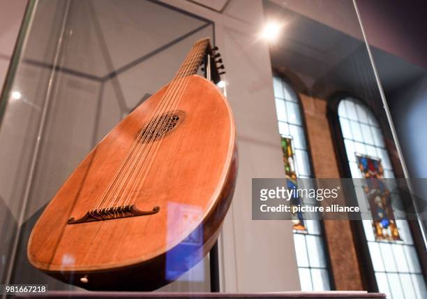 March 2018, Germany, Eisenach: An old plucked string instrument is part of the exhibition '950 years Wartburg', which allows visitors to stroll...
