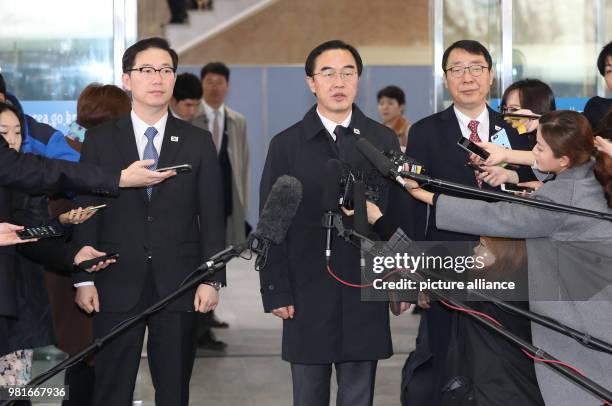 South Korea's Unification MinisteR and chief delegate to the high-level talks with Pyongyang, Cho Myoung-gyon speaks to media before heading to the...