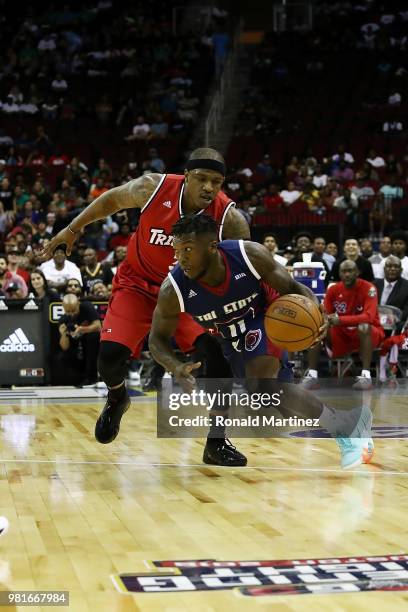 Nate Robinson of Tri State handles the ball against Rashad McCants of Trilogy during week one of the BIG3 three on three basketball league at Toyota...