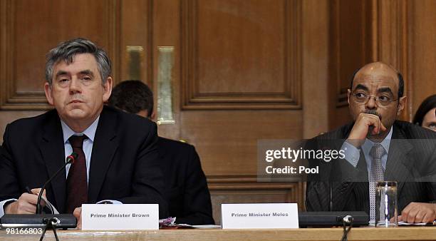 British Prime Minister Gordon Brown is pictured with Ethiopia's Prime Minister Meles Zenawi as he hosts the Climate Finance Group at 10 Downing...