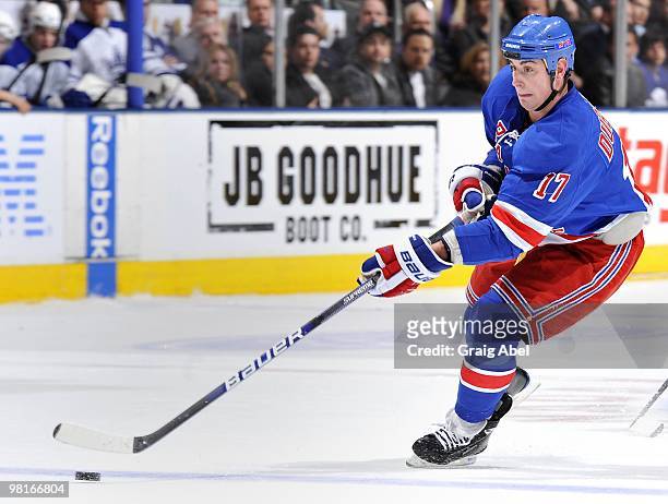 Brandon Dubinsky of the New York Rangers skates with the puck during the game against the Toronto Maple Leafs on March 27, 2010 at the Air Canada...