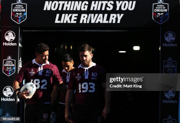 Dane Gagai and Ben Hunt walk onto the field during the Queensland Maroons State of Origin captain's run at ANZ Stadium on June 23, 2018 in Sydney,...