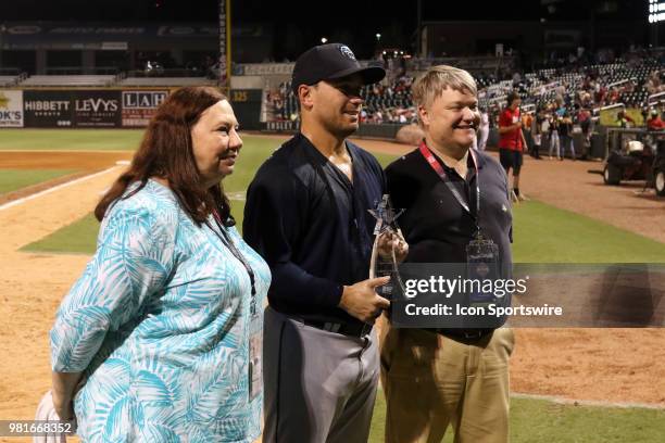 Mobile BayBears outfielder Zach Gibbons receives the MVP trophy after the 2018 Southern League All-Star Game. The South All-Stars defeated the North...