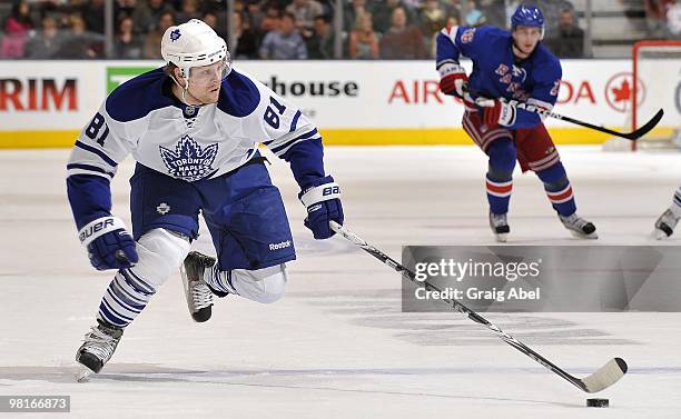 Phil Kessel of the Toronto Maple Leafs skates with the puck during the game against the New York Rangers on March 27, 2010 at the Air Canada Centre...