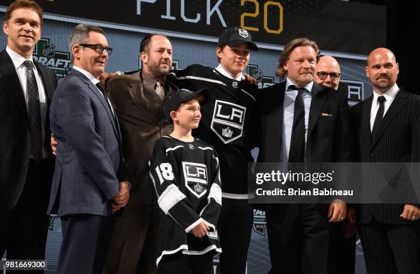 Rasmus Kupari poses for a photo onstage after being selected twentieth overall by the Los Angeles Kings during the first round of the 2018 NHL Draft...