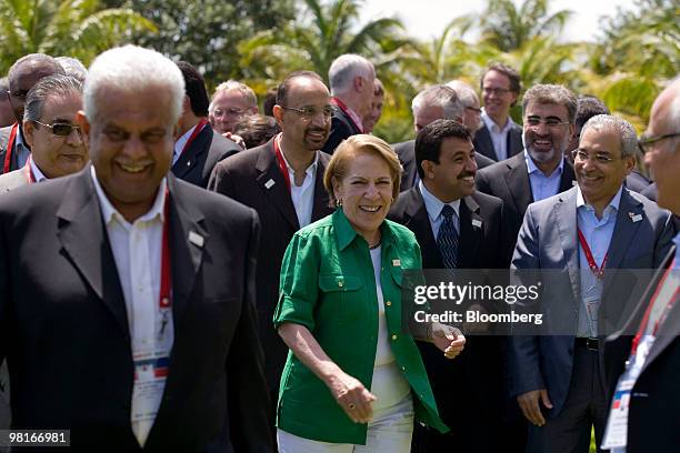 Georgina Kessel, center, energy minister of Mexico and chairwoman of Petroleos Mexicanos , participates in a group photo with other delegates at the...