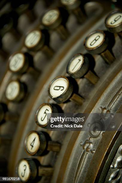 twisted key on old german cash register - cash register stock-fotos und bilder