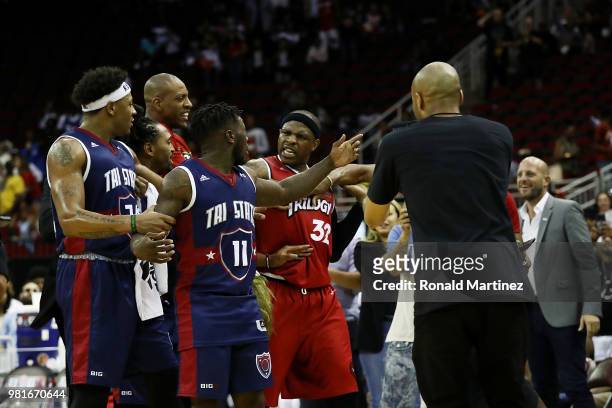 Rashad McCants of Trilogy and Nate Robinson of Tri State argue after the game during week one of the BIG3 three on three basketball league at Toyota...