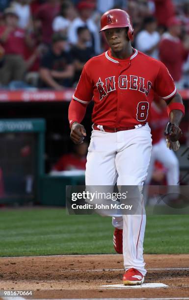 Justin Upton of the Los Angeles Angels scored on a double hit by Albert Pujols in the first inning against the Toronto Blue Jays of Anaheim scores on...