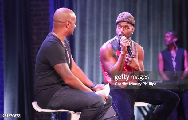 Big Tigger and Luke James speak onstage during Acoustically Speaking, sponsored by M&Ms, during the 2018 BET Experience at Los Angeles Convention...