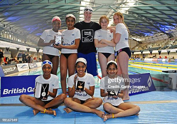 Double Olymian,World, Commnwealth and European Medalist Melanie Marshall lines up with fellow racers before the British Gas Pools for Schools race at...