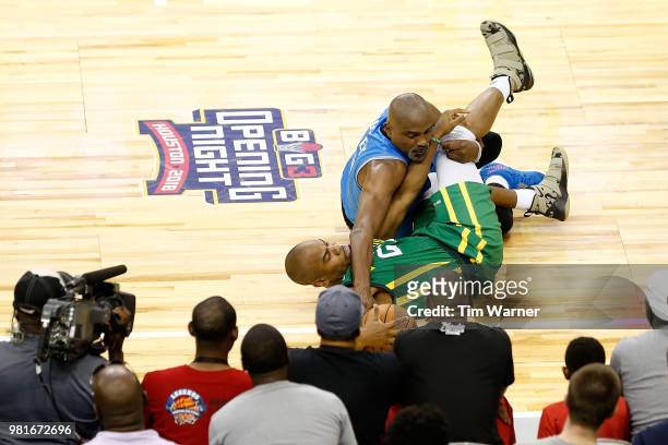 Cuttino Mobley of Power and Andre Owens of Ball Hogs contend for the ball during week one of the BIG3 three on three basketball league at Toyota...
