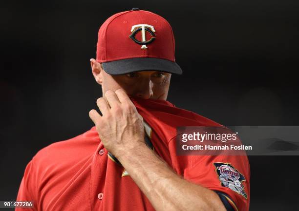 Matt Belisle of the Minnesota Twins looks on after pitching against the Texas Rangers during the ninth inning of the game on June 22, 2018 at Target...